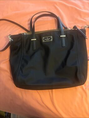 kate spade black nylon tote with gold-tone plaque